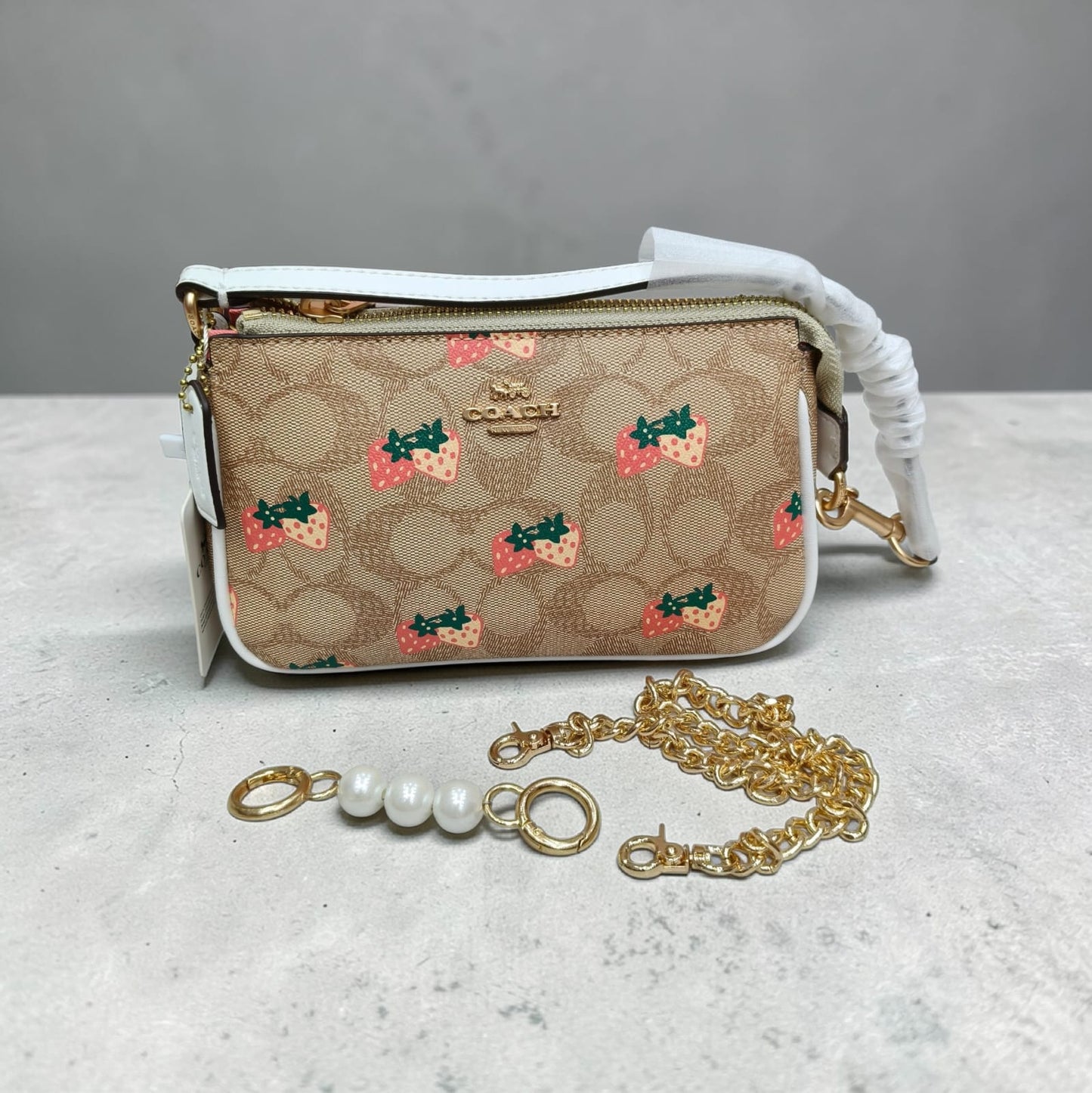 Coach Nolita signature  with strawberry print